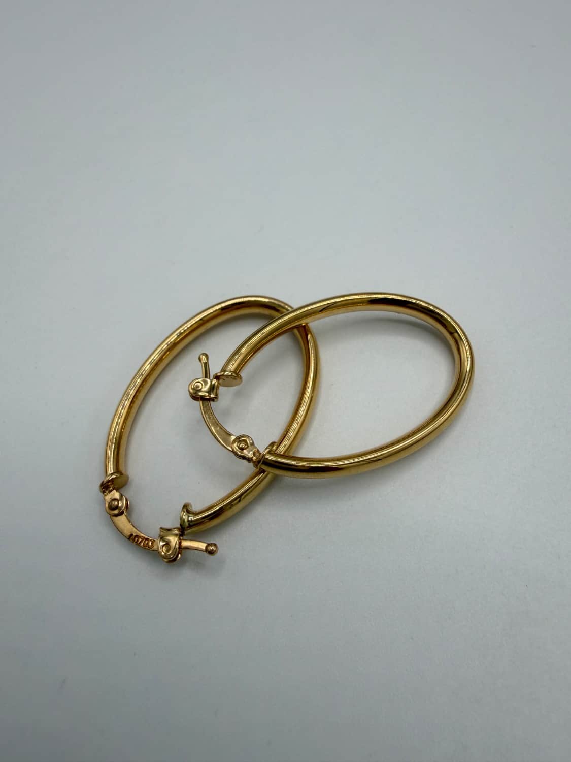گوشواره طلا 18 عیار بیضی وزن 2.580 گرم اجرت ساخت 12 درصد کد GD01 000367