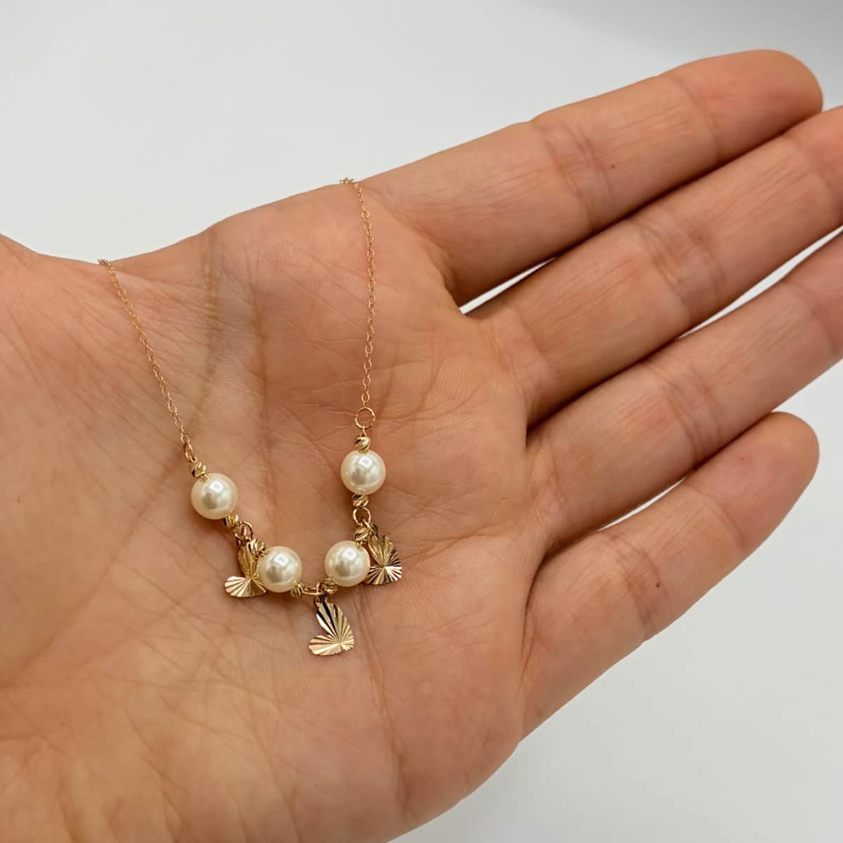 گردنبند طلا 18 عیار قلب تراش و مروارید وزن 1.080 گرم اجرت ساخت 13 درصد کد GD01 000340