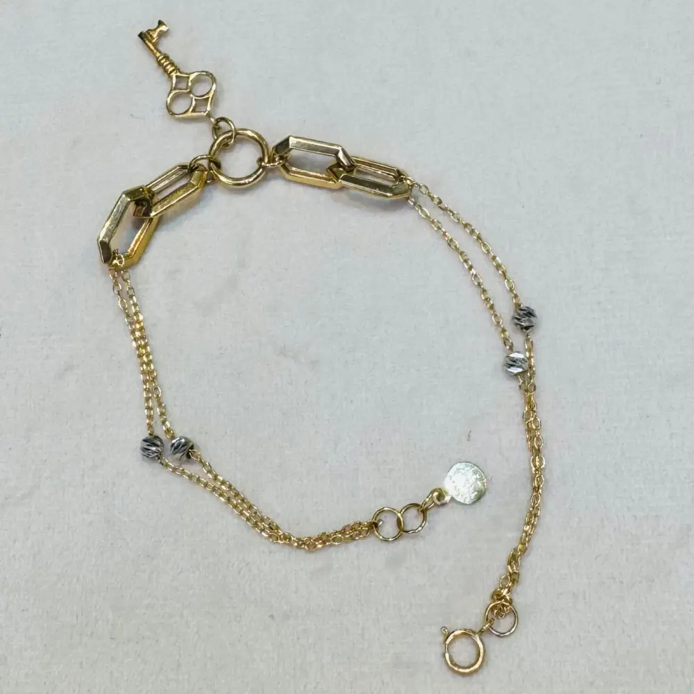 دستبند طلا ۱۸ عیار زنجیر کلید وزن ۳٫۷۸۰ گرم اجرت ساخت ۱۱ درصد کد GD01 000070 - تصویر 3